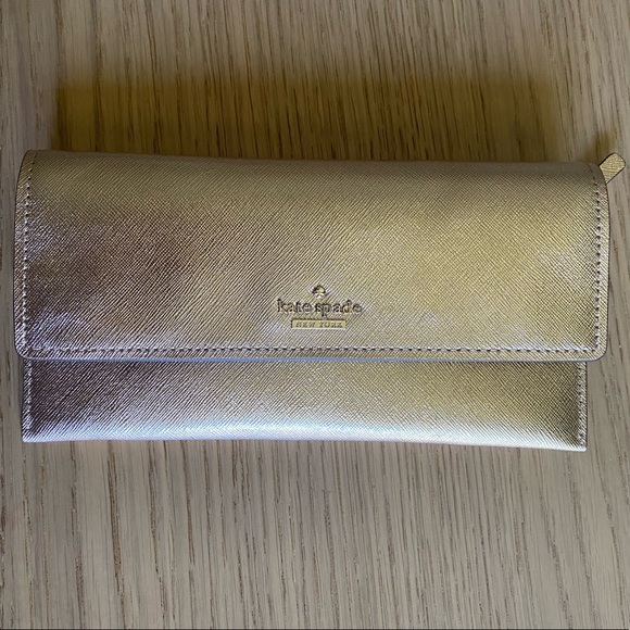 kate spade Handbags - Rose Gold Metallic Kate Spade Clutch Wallet